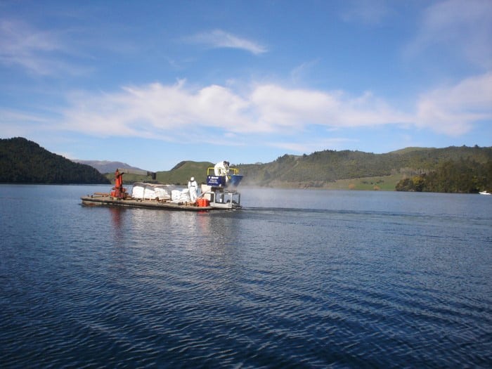 Dry Phoslock granules dispersed over surface for deep lake treatments